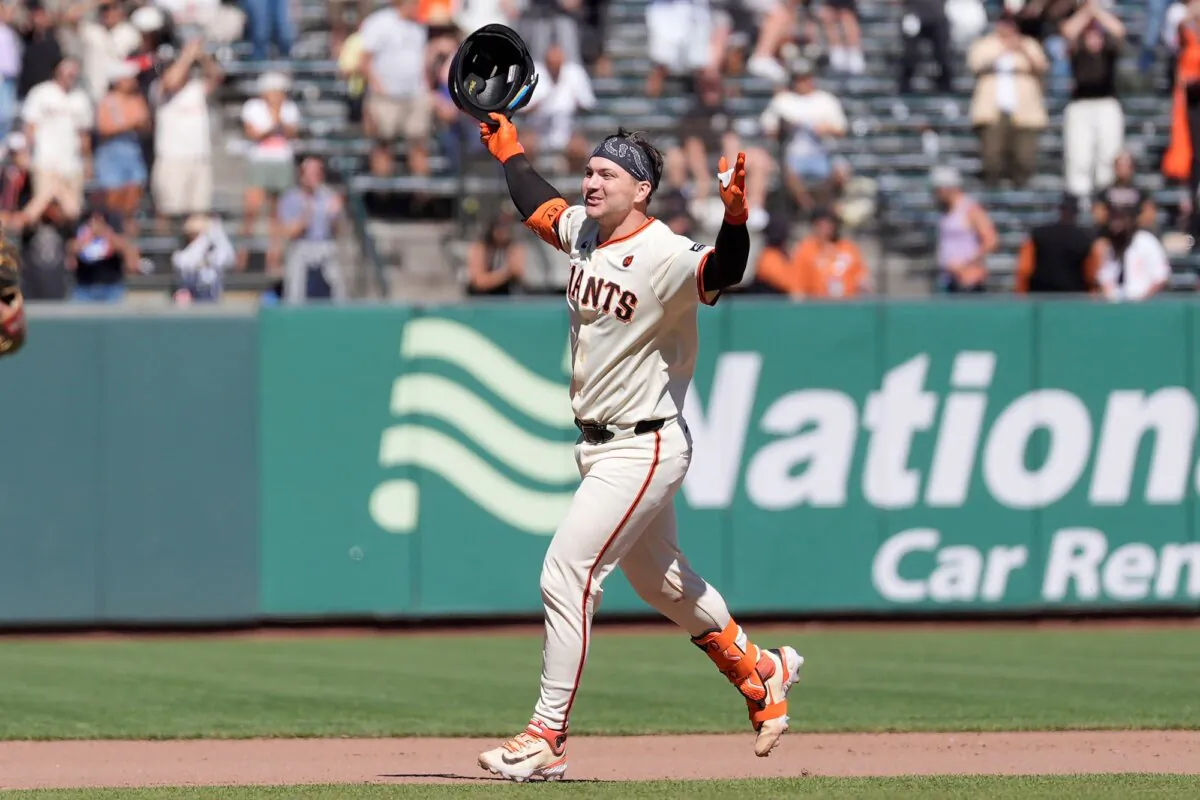 Patrick Bailey of the San Francisco Giants celebrates after his walk-off, ground-rule double in the ninth inning against the Arizona Diamondbacks in San Francisco on Sept. 5, 2024. (Jeff Chiu/AP Photo)