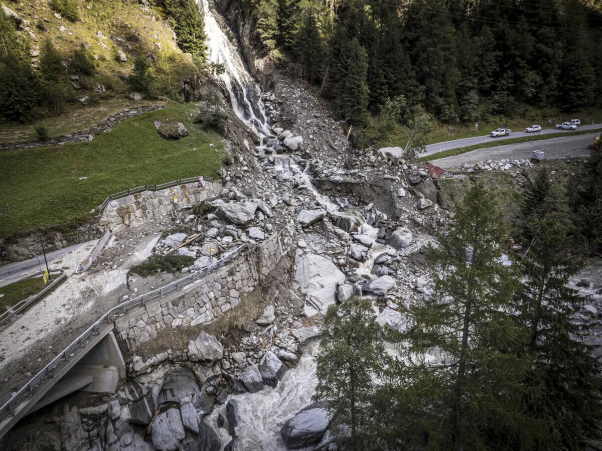 A road is blocked in Eisten, Switzerland, on Sept. 6, 2024, after a landslide following severe weather. (Andrea Soltermann/Keystone via AP)