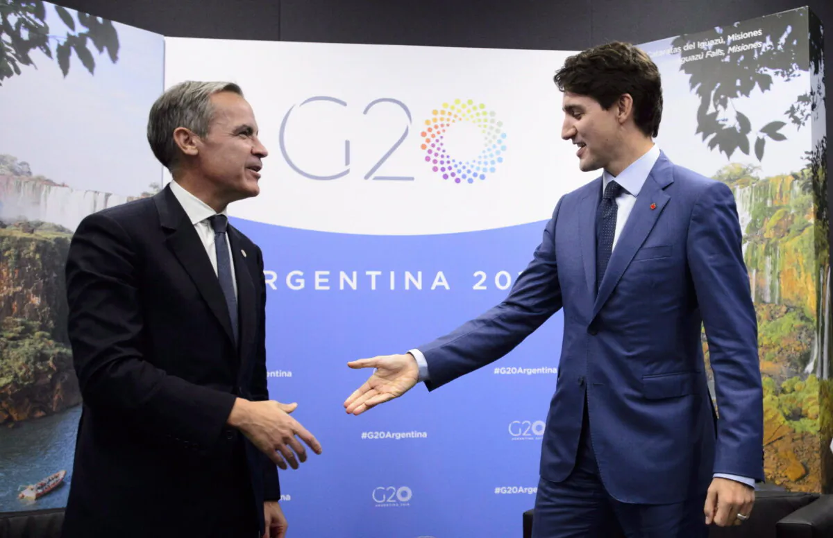 Prime Minister Justin Trudeau meets with then Bank of England governor Mark Carney at the G20 Summit in Buenos Aires, Argentina on Nov. 30, 2018. (The Canadian Press/Sean Kilpatrick)