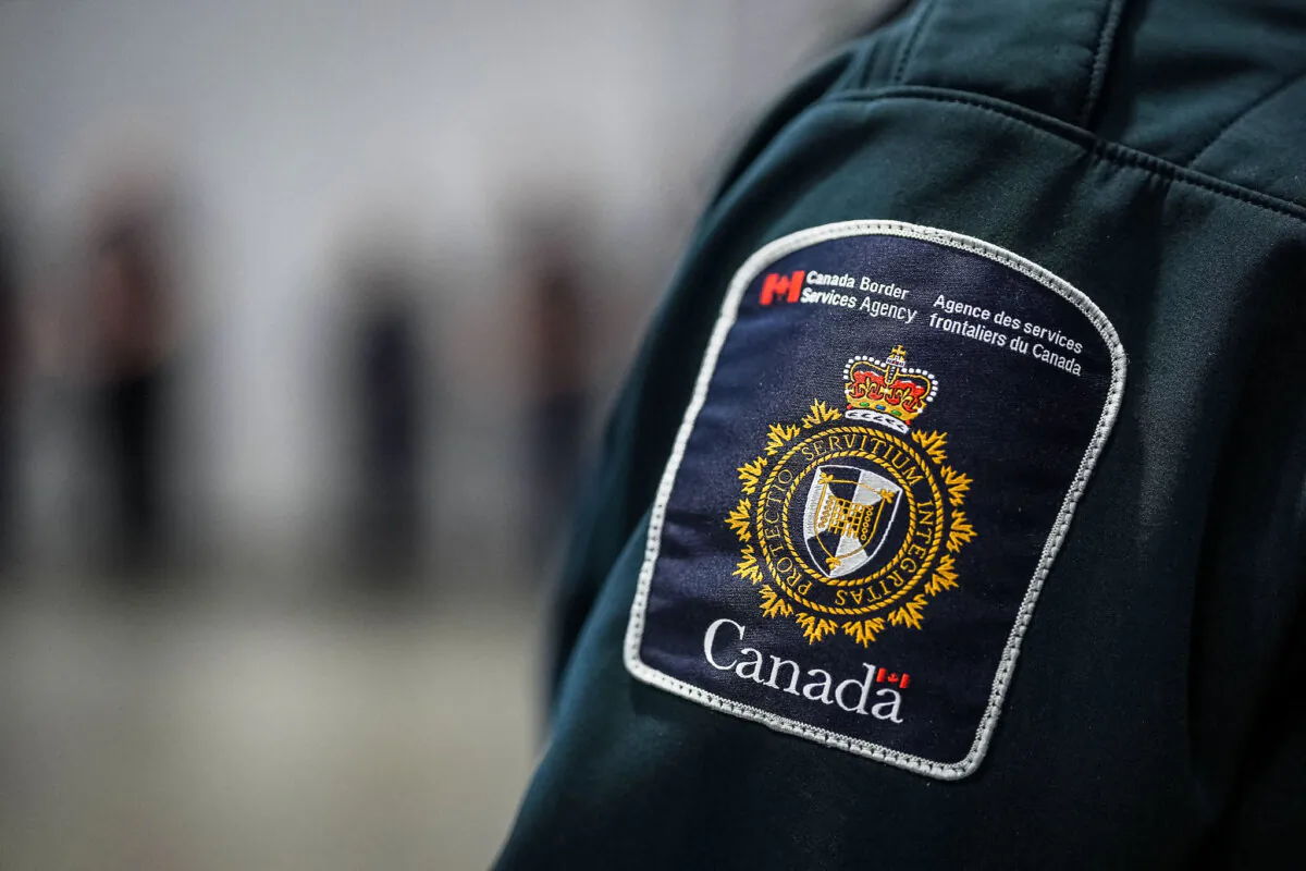 A Canada Border Services Agency (CBSA) patch is seen on a CBSA officer’s uniform in Tsawwassen, B.C., on Dec. 16, 2022. (The Canadian Press/Darryl Dyck)