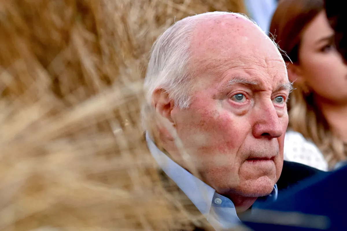 Former Vice President Dick Cheney listens as his daughter Rep. Liz Cheney (R-Wyo.) speaks during an election night event during the Wyoming primary election at Mead Ranch in Jackson, Wyo., on Aug. 16, 2022. (Patrick T. Fallon/AFP via Getty Images)