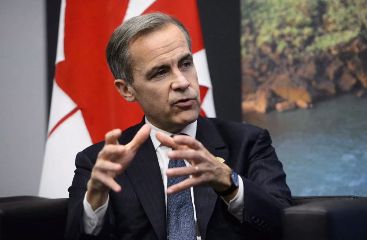 Bank of England governor Mark Carney meets with Prime Minister Justin Trudeau at the G20 Summit in Buenos Aires, Argentina on Nov. 30, 2018. (The Canadian Press/Sean Kilpatrick)