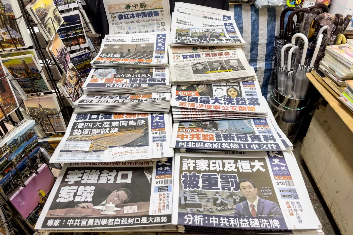 Copies of the Hong Kong edition of The Epoch Times for sale at a newspaper stall in Hong Kong on Aug. 14, 2024. (Adrian Yu/The Epoch Times)