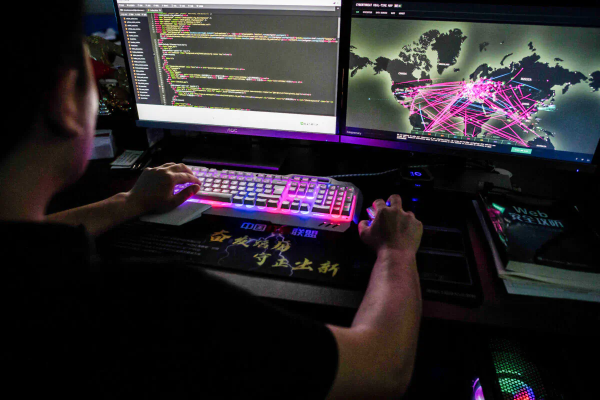 A member of the hacking group Red Hacker Alliance uses a website that monitors global cyberattacks on his computer in Dongguan, Guangdong Province, China, on Aug. 4, 2020. (Nicolas Asfouri/AFP via Getty Images)