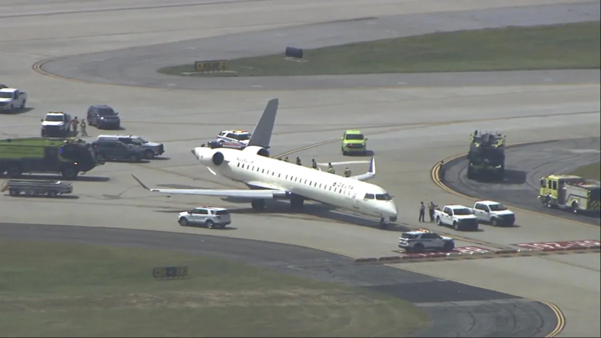 A plane sits damaged at Hartsfield-Jackson Atlanta International Airport after colliding with another plane on a taxiway, on Sept. 10, 2024. (WSB via AP)