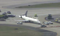 Two Delta Planes Collide on an Atlanta Taxiway, Knocking the Tail Off One