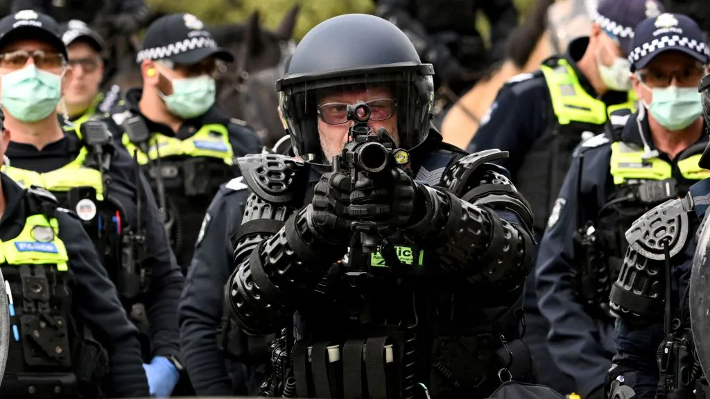 Protesters confront police outside the Land Forces 2024 arms fair in Melbourne on Sept. 11, 2024. (William West/AFP via Getty Images)