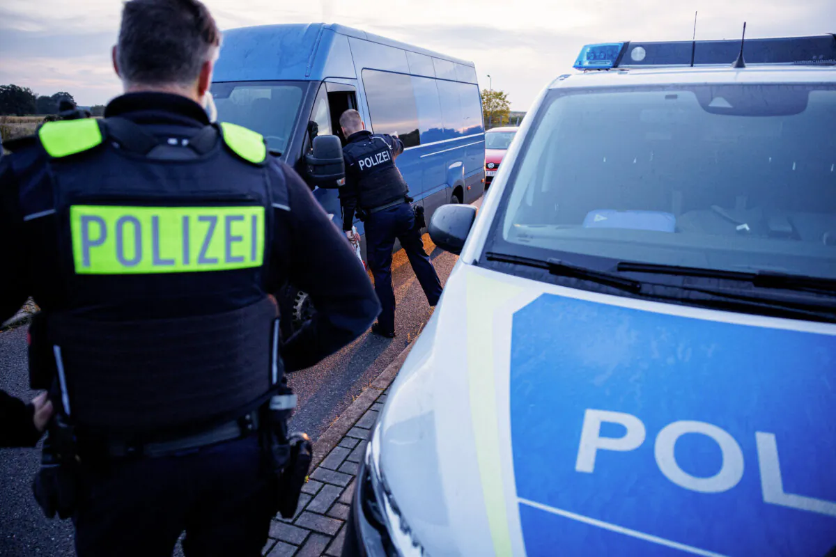 Officers of the German Federal Police (Bundespolizei) stop a van during a patrol near the border with Poland, near Forst, eastern Germany, on Oct. 11, 2023. (Jens Schlueter/AFP via Getty Images)
