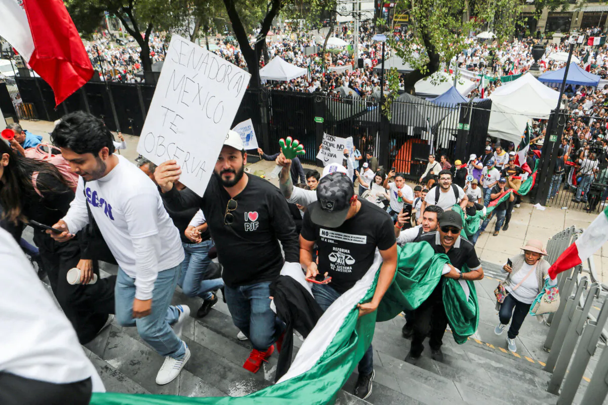 Protesters against judicial reform plan enter the Senate building in Mexico City, Mexico, on Sept. 10, 2024. (Paola Garcia/Reuters)