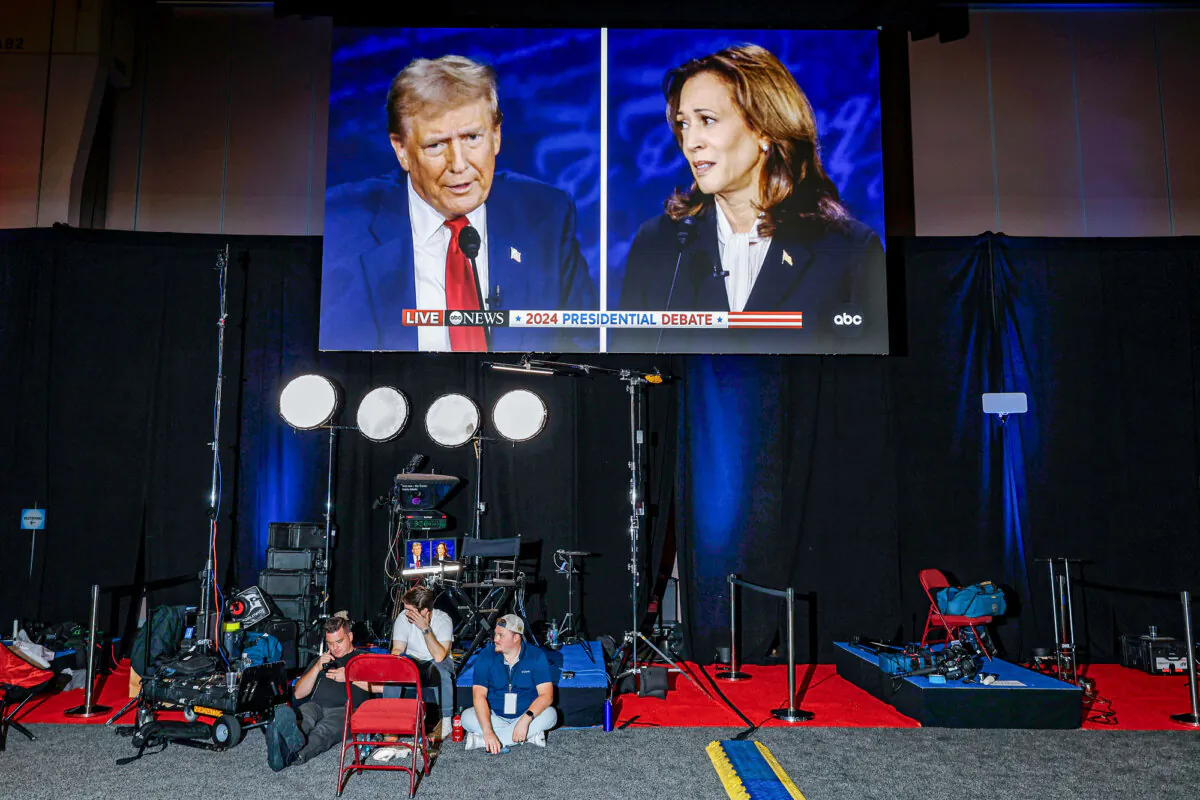 Republican presidential nominee, former President Donald Trump and Democratic presidential nominee, Vice President Kamala Harris are seen on screens in the media center at the Pennsylvania Convention Center in Philadelphia on Sept. 10, 2024. (Chip Somodevilla/Getty Images)