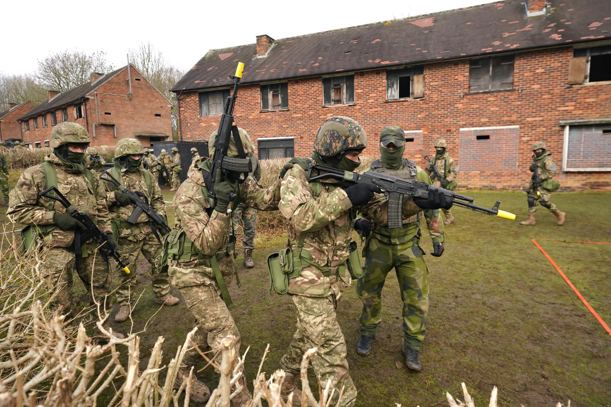 Ukrainian soldiers take part in urban training at a military training camp in Yorkshire, England, on Feb. 16, 2023. (PA Wire/PA Images)