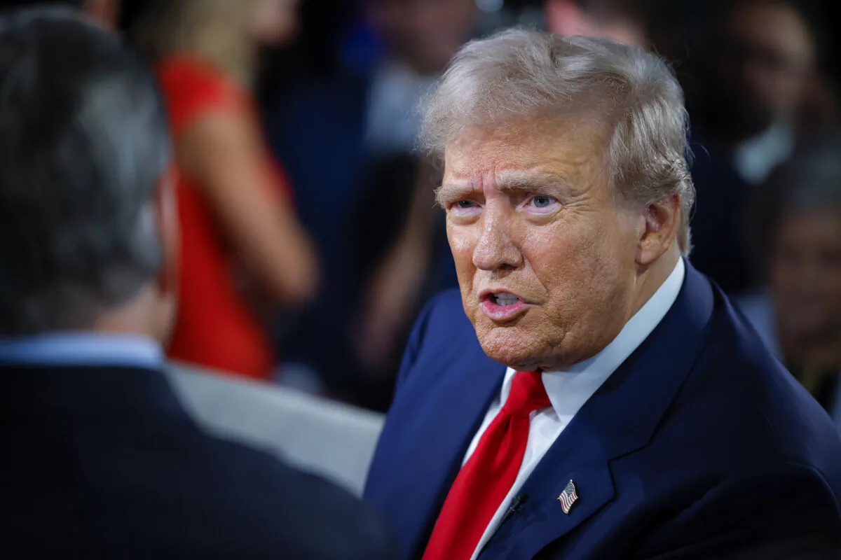 Then-Republican presidential nominee and former President Donald Trump talks with Fox News host Sean Hannity in the spin room, after Trump debated Democratic presidential nominee and Vice President Kamala Harris, at The National Constitution Center in Philadelphia on Sept. 10, 2024. (Chip Somodevilla/Getty Images)