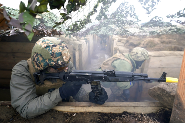 Ukrainian soldiers take part in a military exercise at a military training camp in Yorkshire, England, on Feb. 16, 2023. (PA Wire/PA Images)