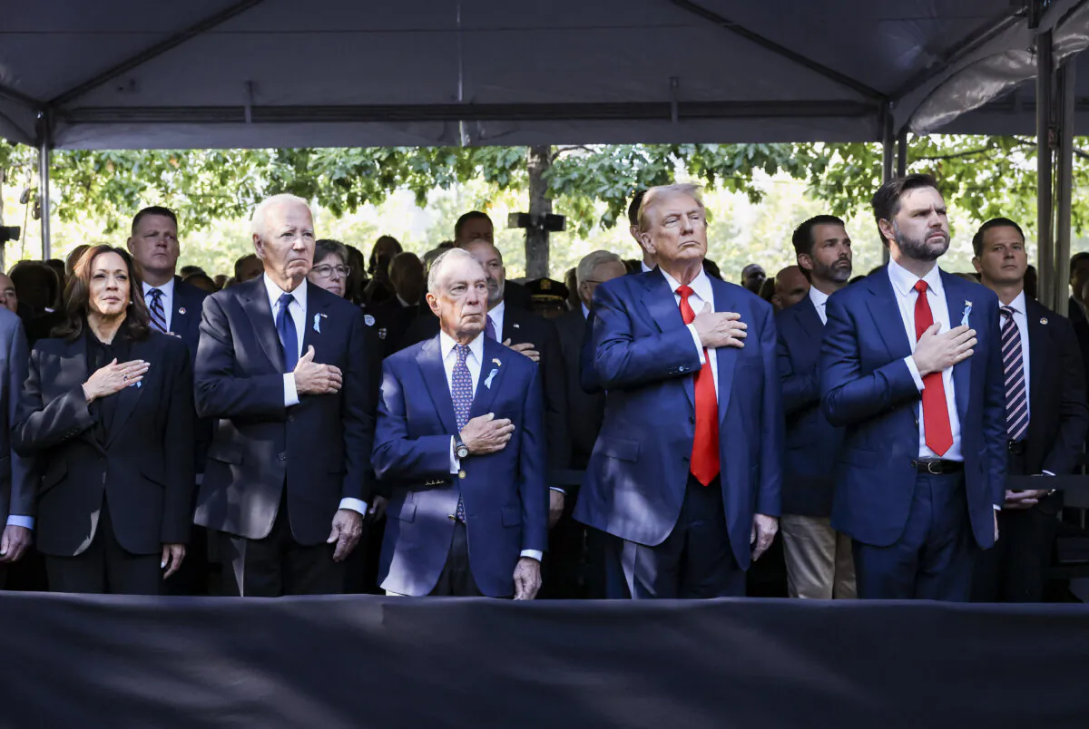 (L–R) Democratic presidential nominee and Vice President Kamala Harris, President Joe Biden, former New York Mayor Michael Bloomberg, Republican presidential nominee and former President Donald Trump, and Republican vice presidential nominee and Sen. JD Vance (R-Ohio) join family and friends at Ground Zero honoring the lives of those lost on the 23rd anniversary of the terror attacks of Sept. 11, 2001, at the World Trade Center in New York City on Sept. 11, 2024. (Michael M. Santiago/Getty Images)