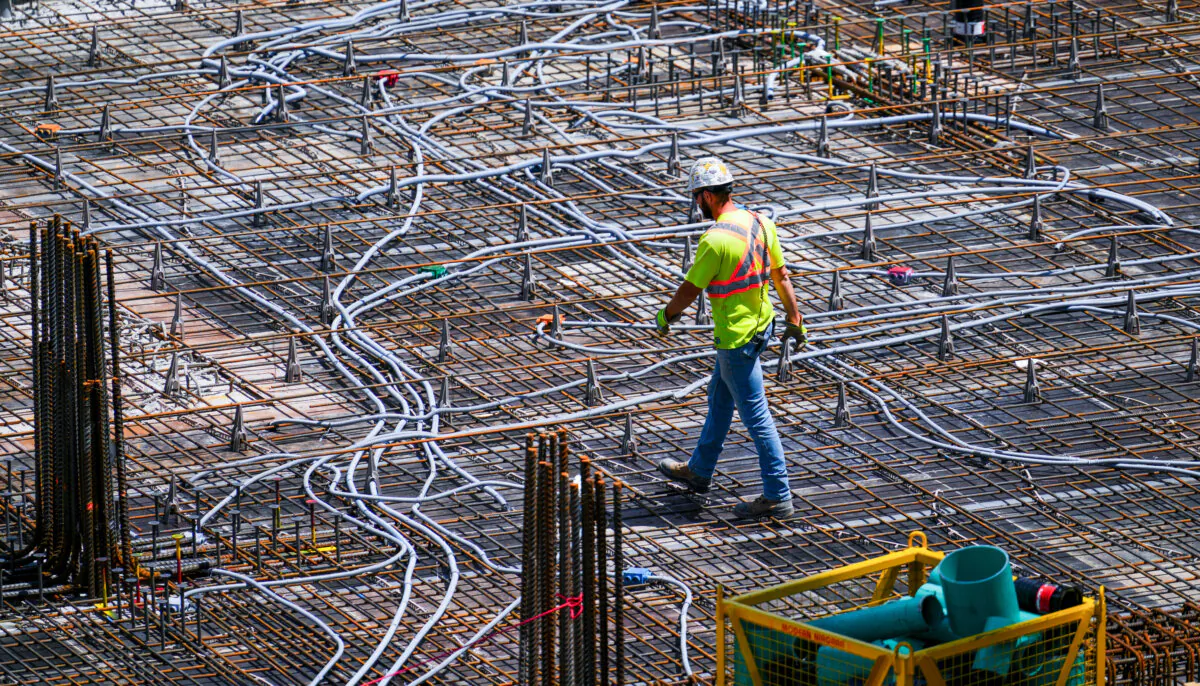 A construction worker makes his way through a site in Ottawa on June 27, 2024. (The Canadian Press/Sean Kilpatrick)