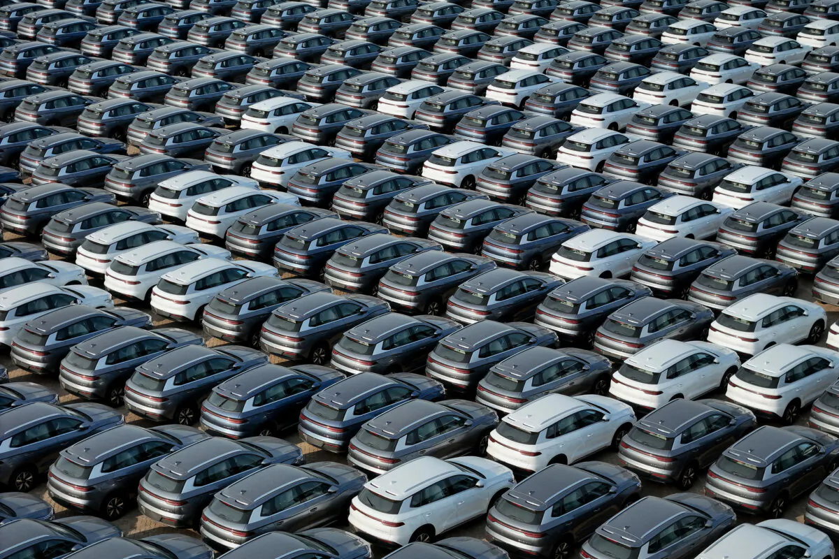 BYD electric cars for export are seen waiting to be loaded onto a ship at a port in Yantai, in eastern China's Shandong Province, on April 18, 2024. (STR/AFP via Getty Images)