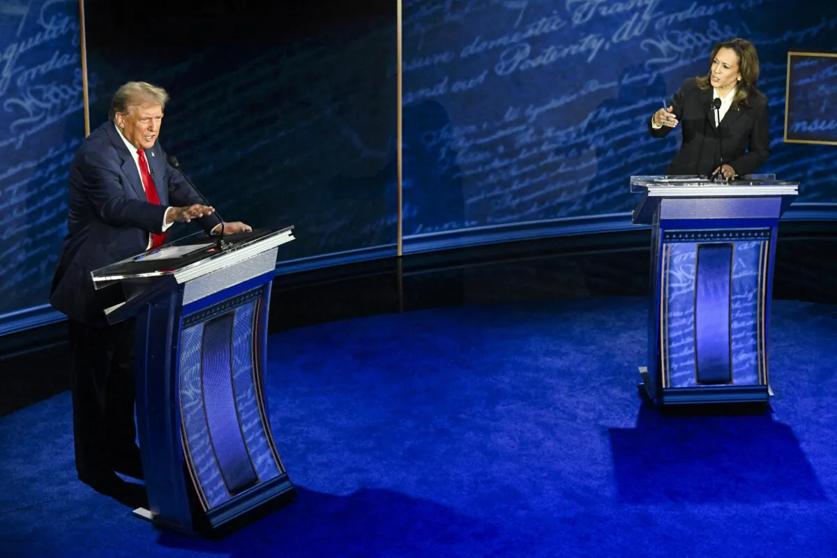 Former President Donald Trump (L) and Vice President Kamala Harris speak during a presidential debate at the National Constitution Center in Philadelphia on Sept. 10, 2024. (Saul Loeb/AFP via Getty Images)