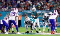 Sports Brief: Bills Smash Dolphins in AFC Showdown; Early Rivalry Games in College Football Week 3; Baseball Wildcard Races Head to the Wire