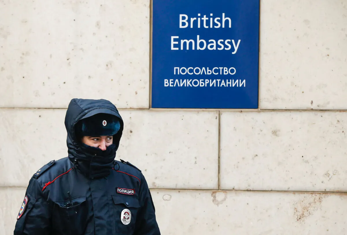 A Russian policeman walks outside the British embassy in Moscow, Russia, March 17, 2018. (Reuters/David Mdzinarishvili)