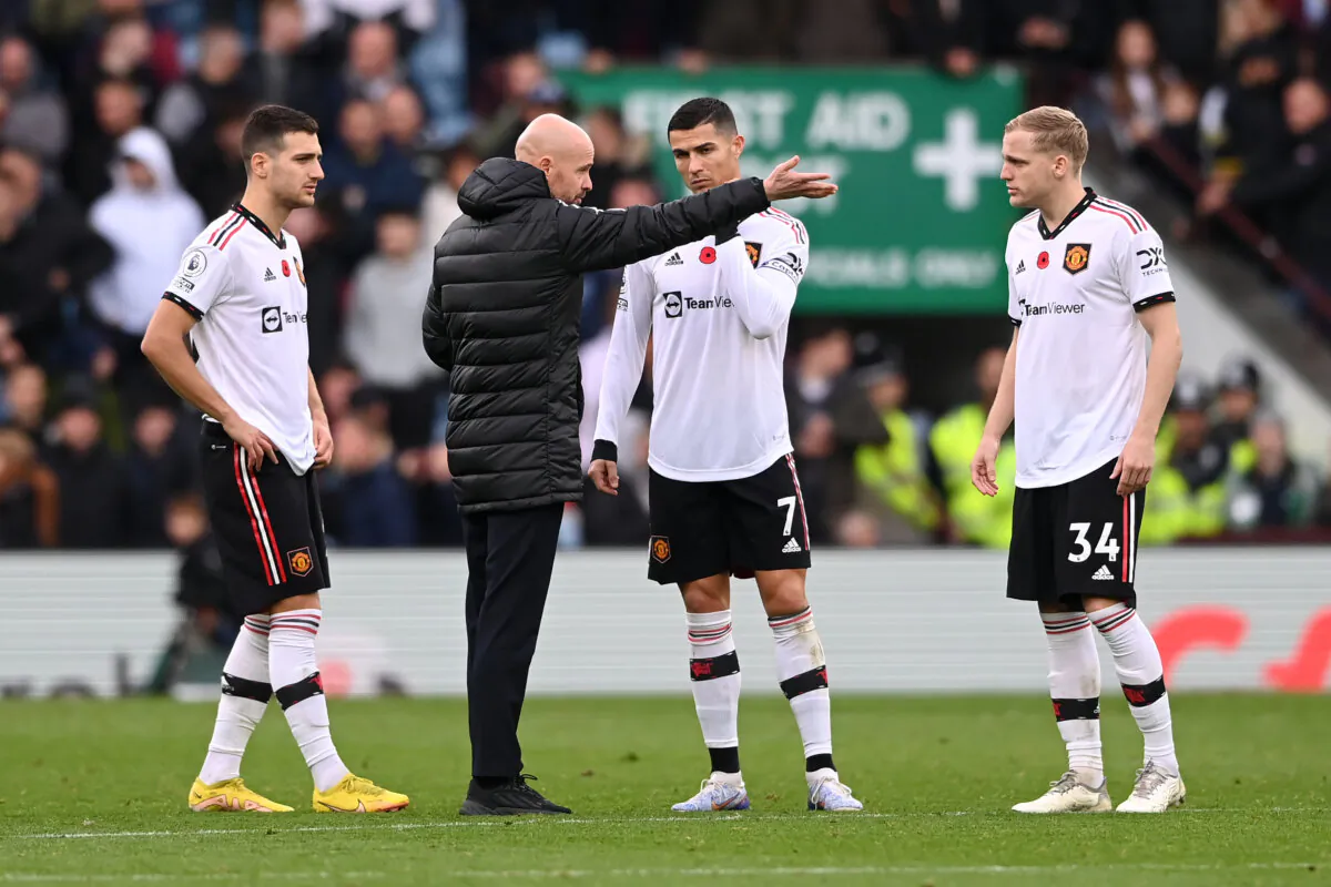 Erik ten Hag speaks to Cristiano Ronaldo of Manchester United during the Premier League match between Aston Villa and Manchester United at Villa Park in Birmingham, England, on Nov. 6, 2022. (Stu Forster/Getty Images)
