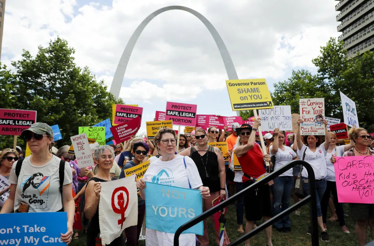 FILE - Abortion-rights supporters take part in a protest, May 30, 2019, in St. Louis. (AP Photo/Jeff Roberson, File)