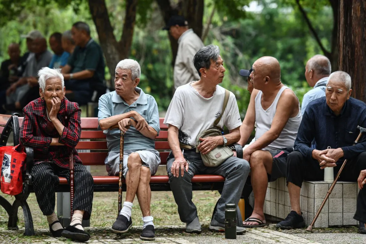 Elderly people rest at a park in Fuyang in eastern China's Anhui Province on Sept. 13, 2024. (STR/AFP via Getty Images)
