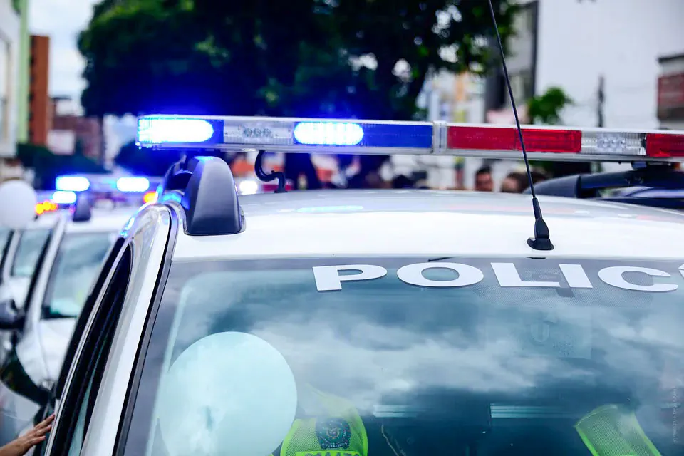 Police car sirens flash in a file photo. (Public Domain)