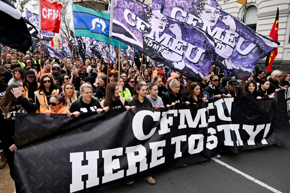 Tens of thousands of workers march after walking off work sites in protest against the forced administration of the construction arm of the Construction, Forestry, Mining and Energy Union (CFMEU), in Melbourne, Australia on Aug. 27, 2024. (William West/AFP via Getty Images)