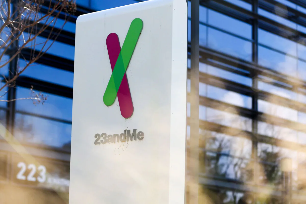 The corporate logo is posted in front of the 23andMe headquarters in Sunnyvale, California, on Feb. 1, 2024. (Justin Sullivan/Getty Images)