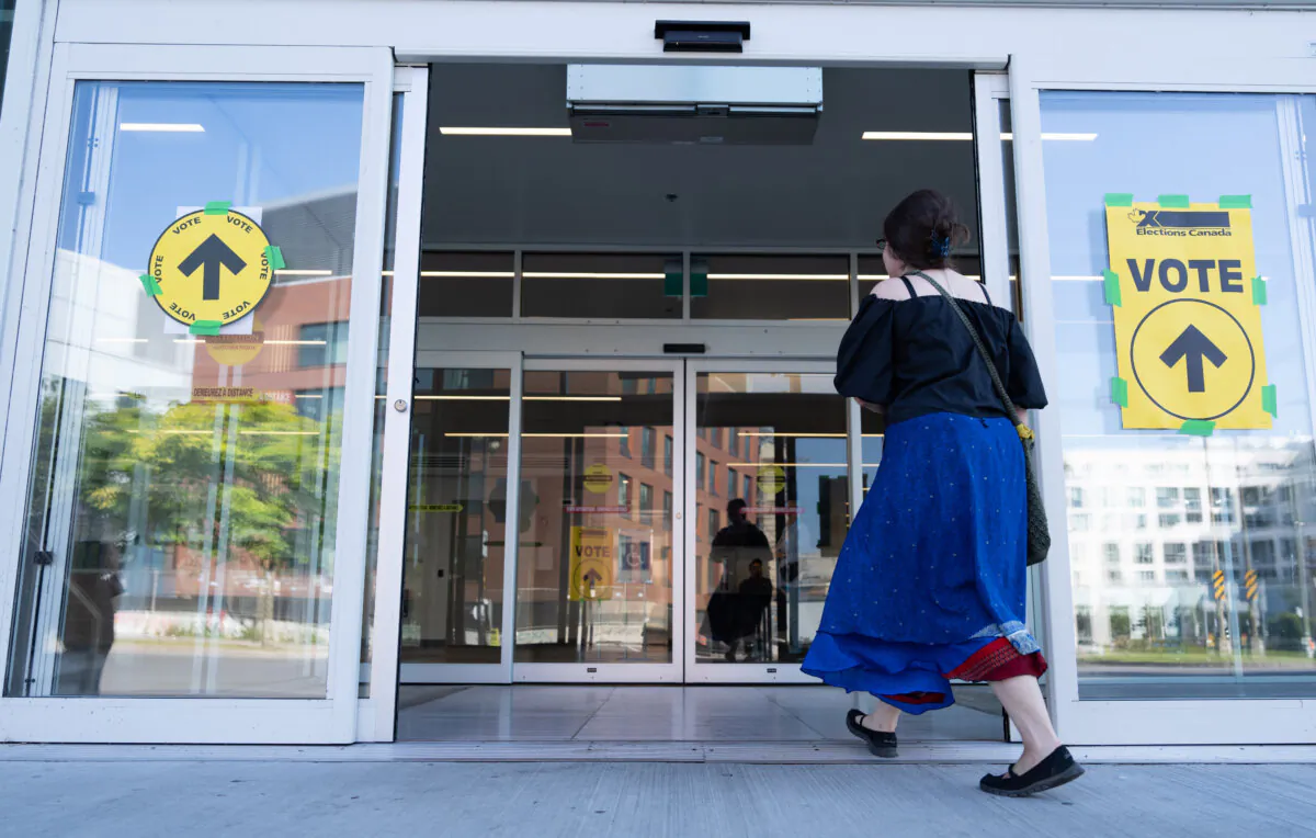 Voters arrive to cast their ballots in the federal byelection for the riding of Lasalle-Emard-Verdun, in Montreal, on Sept. 16, 2024. (The Canadian Press/Christinne Muschi)