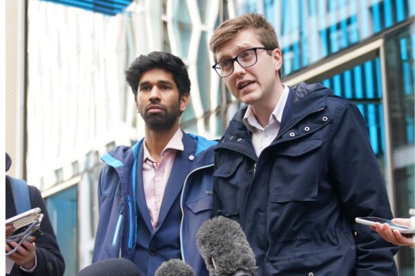 Co-chairmen of the BMA's Junior Doctors Committee Vivek Trivedi (left) and Robert Laurenson (right) speaking to the media outside the Department Of Health and Social Care, in London, England, on March 2, 2023. (PA Wire/PA Images)