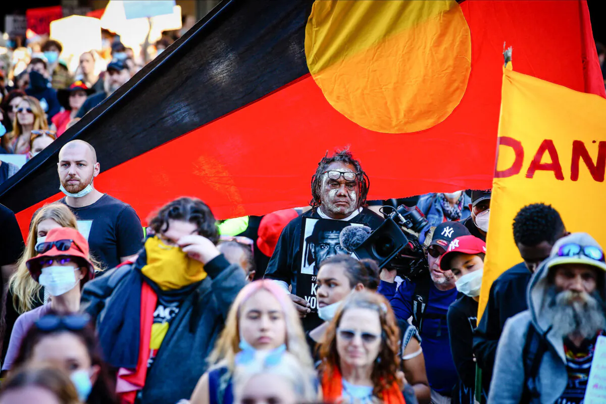 Demonstrators attend a Black Lives Matter protest to express solidarity with US protestors at King George Square in Brisbane, Australia on June 6, 2020. (Patrick Hamilton/AFP via Getty Images)
