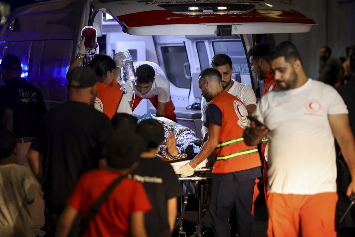 A person is carried on a stretcher outside American University of Beirut Medical Center as people, including Hezbollah terrorists, were wounded and killed when the pagers they use to communicate exploded across Lebanon, in Beirut, Lebanon, on Sept. 17, 2024. (Mohamed Azakir/Reuters)