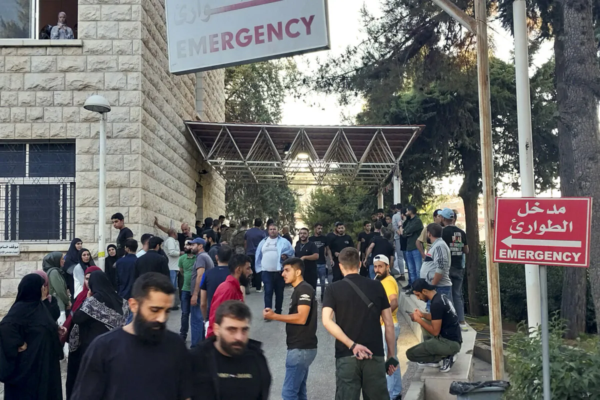 People gather outside a hospital in Baalbek in east Lebanon after communication devices exploded for a second day in Hezbollah strongholds in the country, on September 18, 2024. (Photo by -/AFP via Getty Images)