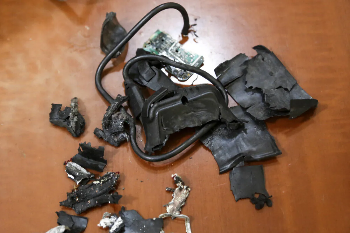 TOPSHOT - A photo taken on September 18, 2024, in Beirut's southern suburbs shows the remains of exploded pagers on display at an undisclosed location. Hundreds of pagers used by Hezbollah members exploded across Lebanon on September 17, killing at least nine people and wounding around 2,800 in blasts the Iran-backed militant group blamed on Israel. (Photo by AFP) (Photo by -/AFP via Getty Images)