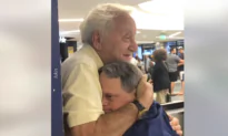 Father and Son Hug After Reuniting at the Airport