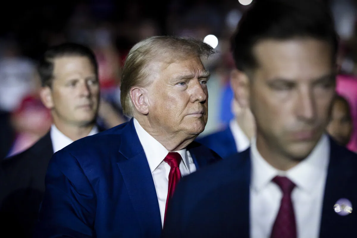 Republican presidential nominee, former President Donald Trump arrives for a campaign event, his first since a man carrying a rifle was arrested on Sept. 15 near where Trump was playing golf at his club in Florida, in the Dort Financial Center in Flint, Mich., on Sept. 17, 2024. (Scott Olson/Getty Images)