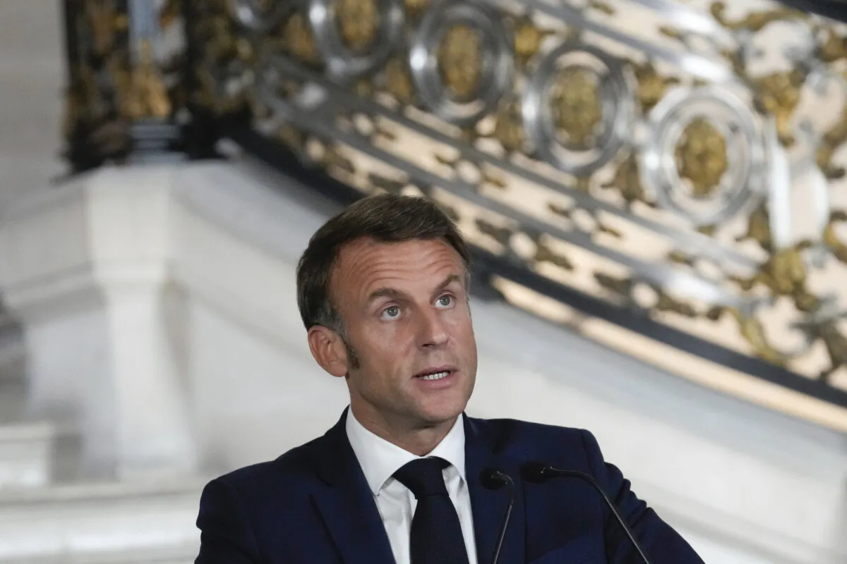 France's President Emmanuel Macron delivers a speech during a session of the Constitutional Council to mark the start of the new school year, in Paris, on Sept. 11, 2024. (The Canadian Press/AP, Michel Euler)