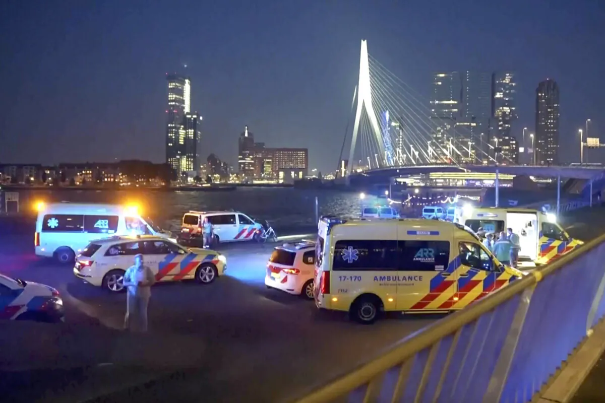 Personnel respond to a stabbing incident in the port city of Rotterdam, Netherlands, late on Sept. 19, 2024. (Media TV via AP)