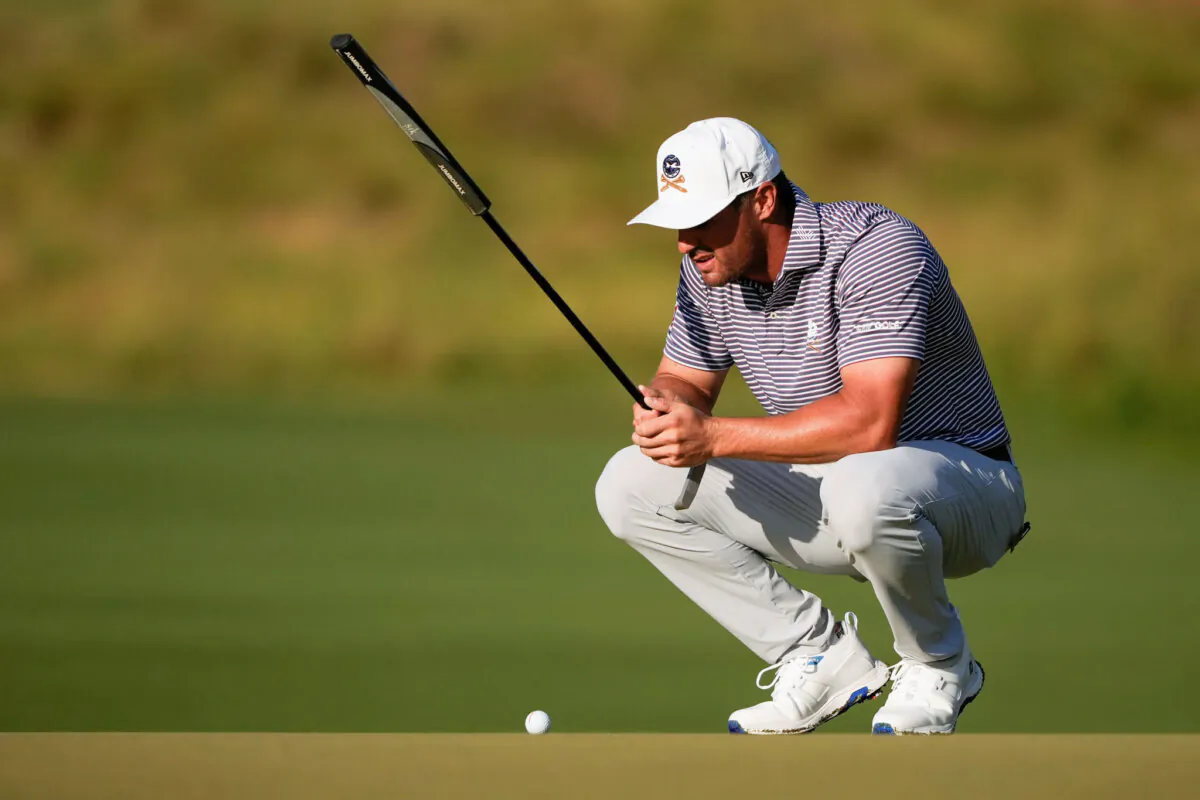 Bryson DeChambeau lines up a putt on the first hole during the second round of the U.S. Open golf tournament in Pinehurst, N.C., on June 14, 2024. (Matt York/AP Photo)