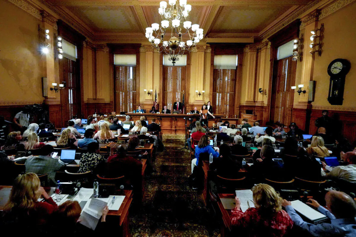 Georgia's State Election Board members discuss proposals to a full room for election rule changes at the state capitol in Atlanta on Sept. 20, 2024. (Mike Stewart/AP Photo)