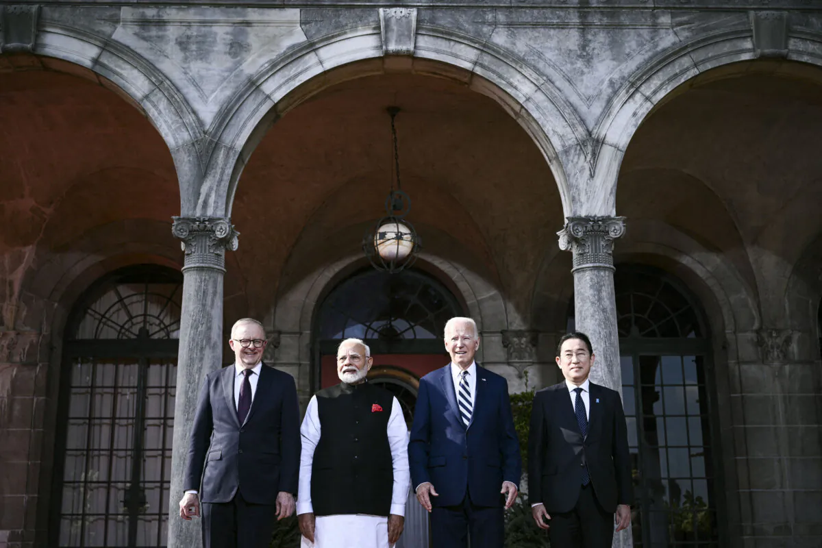 U.S. President Joe Biden (3rd R) participates in a Quadrilateral Summit family photo with Australian Prime Minister Anthony Albanese (L), Indian Prime Minister Narendra Modi (2nd L), and Japanese Prime Minister Fumio Kishida (R) at the Archmere Academy in Wilmington, Del., on Sept. 21, 2024. (Brendan Smialowski/AFP via Getty Images)
