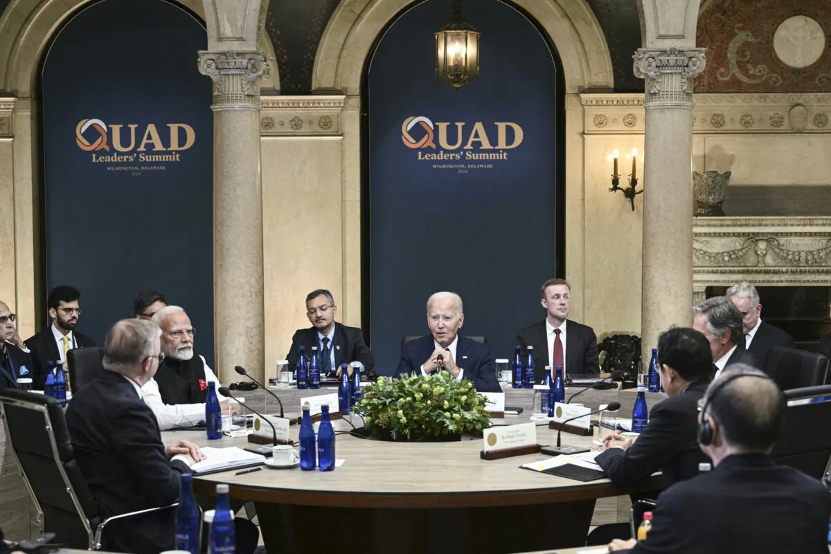 U.S. President Joe Biden (C) meets with (L-R, at table) Australian Prime Minister Anthony Albanese, Indian Prime Minister Narendra Modi, Japanese Prime Minister Fumio Kishida, and U.S. Secretary of State Antony Blinken during the Quadrilateral Summit at the Archmere Academy in Wilmington, Del., on Sept. 21, 2024. (Brendan Smialowski/AFP via Getty Images)
