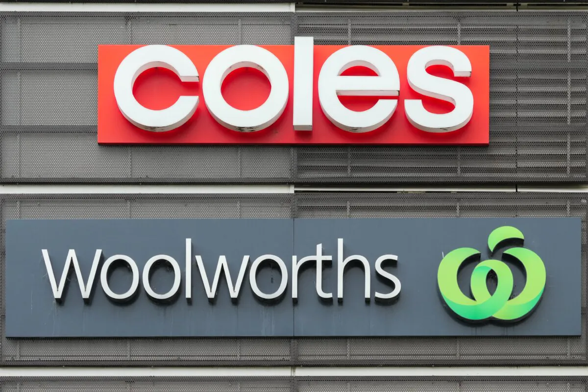 Woolworths and Coles supermarket signage in Melbourne, Australia on March 13, 2024. (Asanka Ratnayake/Getty Images)