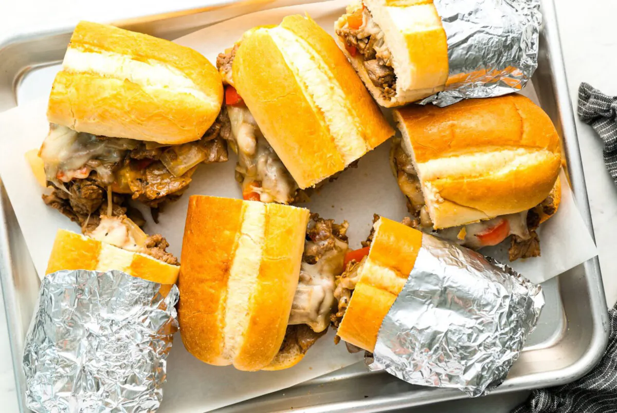 This step-by-step guide walks you through creating the perfect sandwich—thinly sliced steak, melty cheese, and sautéed onions all tucked into a warm, toasty roll—every time. (Jennifer Segal)