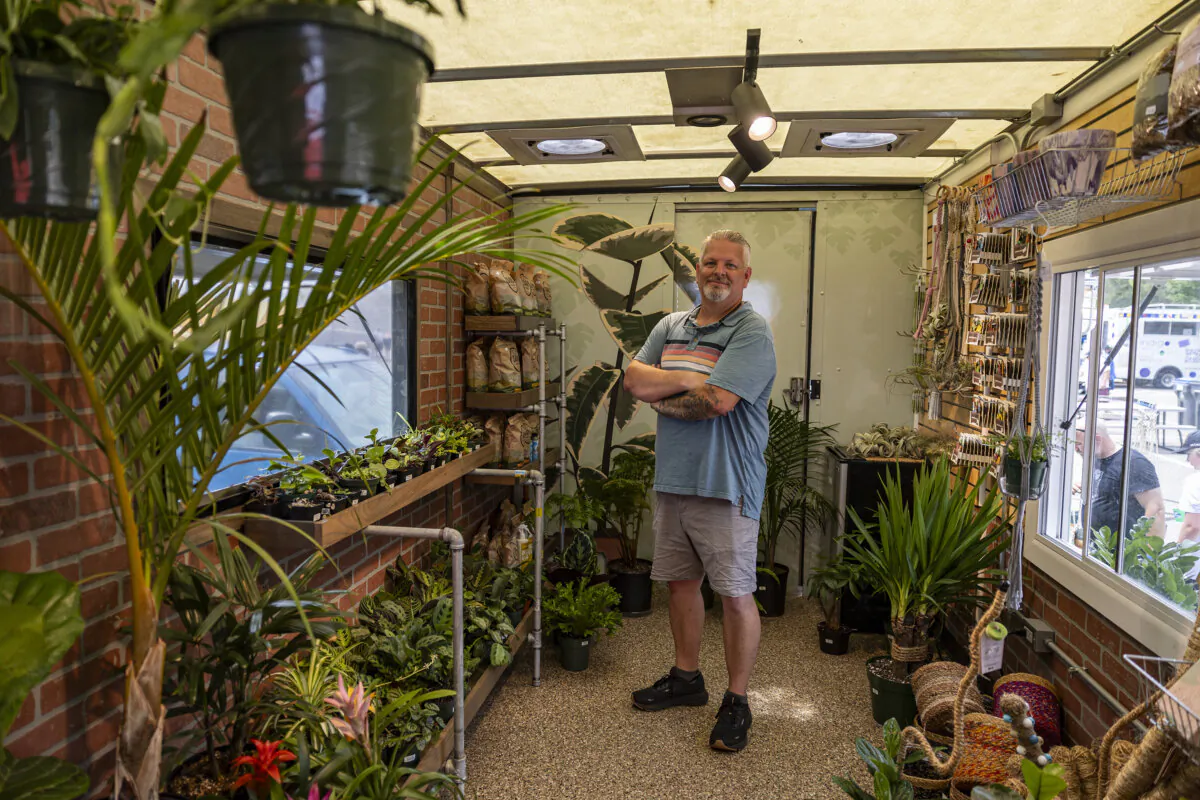 Roots, Shoots and Leaves owner Marc Eaton poses for a portrait in the back of his truck during the St. Paul Food Truck Festival at Union Depot Lot C in St. Paul, Minnesota, on July 14, 2024. (Ayrton Breckenridge/The Minnesota Star Tribune/TNS)