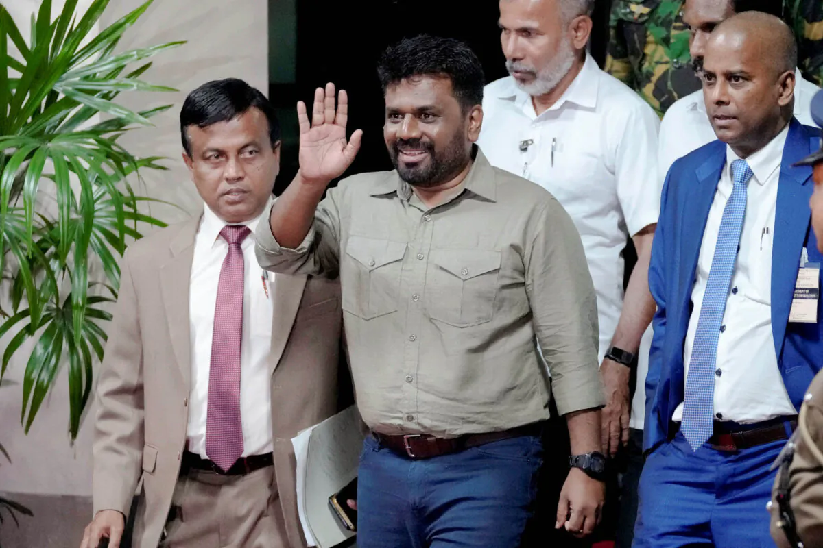 Marxist lawmaker Anura Kumara Dissanayake waves as he departs the election commission office after winning the presidential election in Colombo, Sri Lanka, on Sept. 22, 2024. (Eranga Jayawardena/AP)