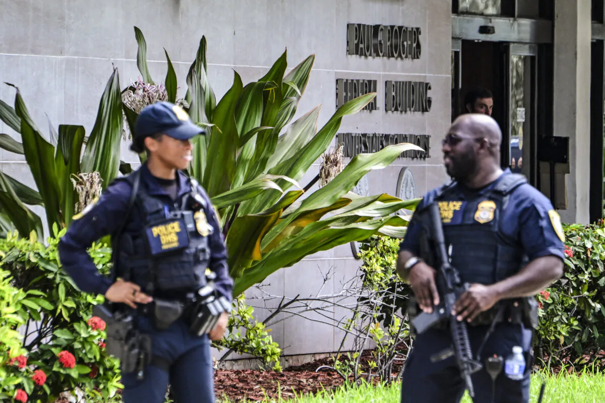 Department of Homeland Security police officers stand watch outside the Paul G. Rogers Federal Building and U.S. Courthouse during a hearing on the detention of Ryan Wesley Routh, suspected of the attempted assassination of former President Donald Trump, in West Palm Beach, Fla., on Sept. 23, 2024. (Giorgio Viera/AFP via Getty Images)