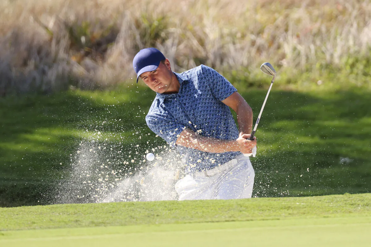Jordan Spieth of the United States plays a shot from a bunker on the first hole during the second round of the FedEx St. Jude Championship at TPC Southwind in Memphis, Tenn., on Aug.16, 2024. (Mike Mulholland/Getty Images)