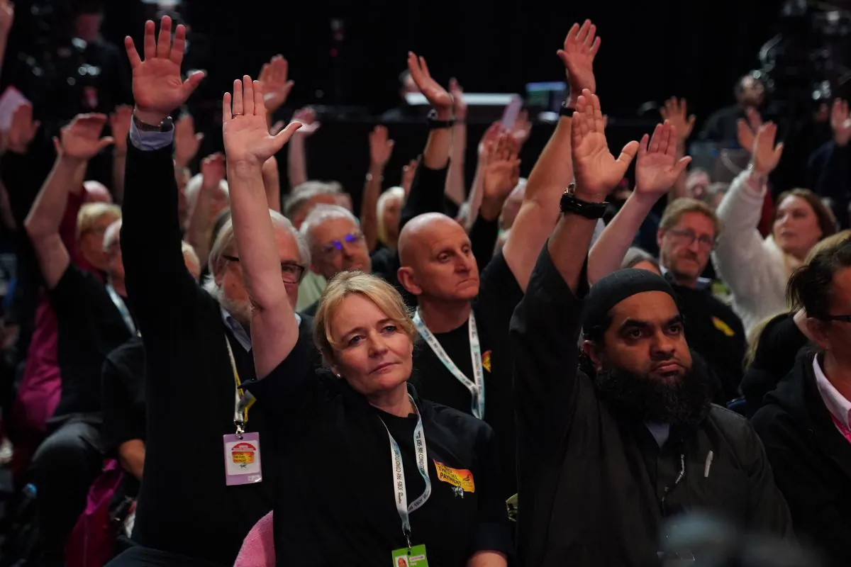 Unite General Secretary Sharon Graham (front left) votes with other delegates in favour of a motion calling for the winter fuel cut to be reversed during the Labour Party Conference at the ACC Liverpool in England on Sept. 25, 2024. (Stefan Rousseau/PA Wire)
